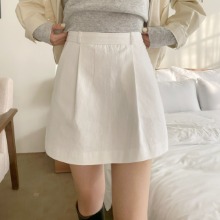 a tight cotton A-line skirt