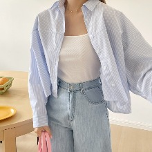 a cropped striped long-sleeved shirt